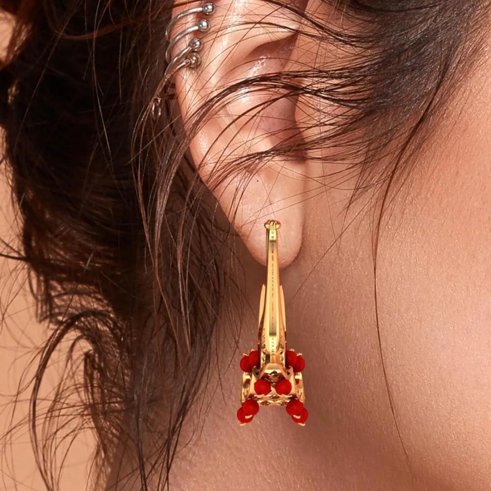 18k Gold Earrings With Floral Designs And Red Stones