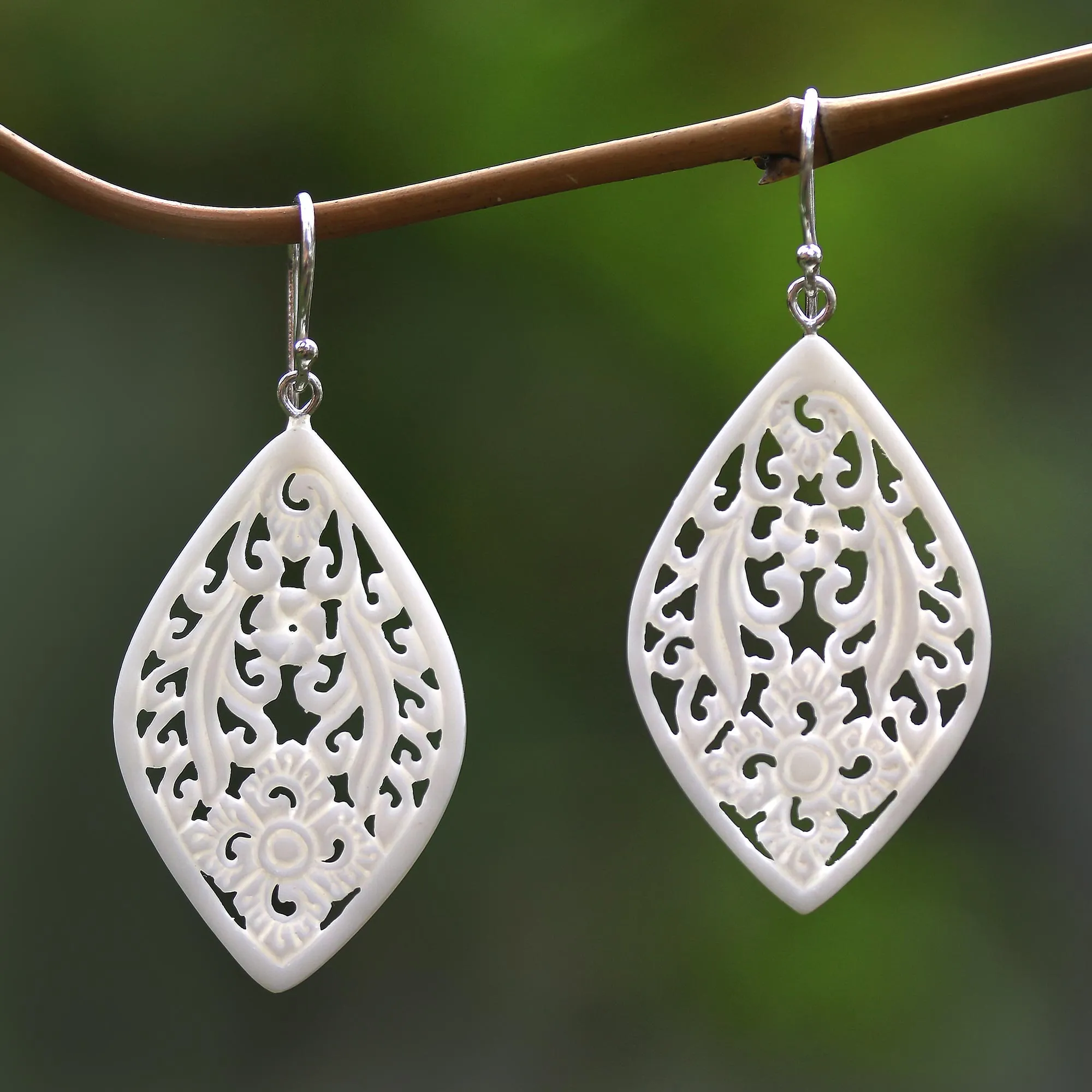 Hand-Carved Floral Bone Dangle Earrings from Bali - Bali Windows | NOVICA