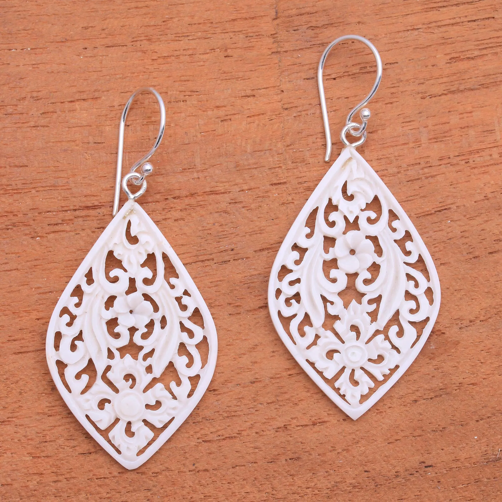 Hand-Carved Floral Bone Dangle Earrings from Bali - Bali Windows | NOVICA