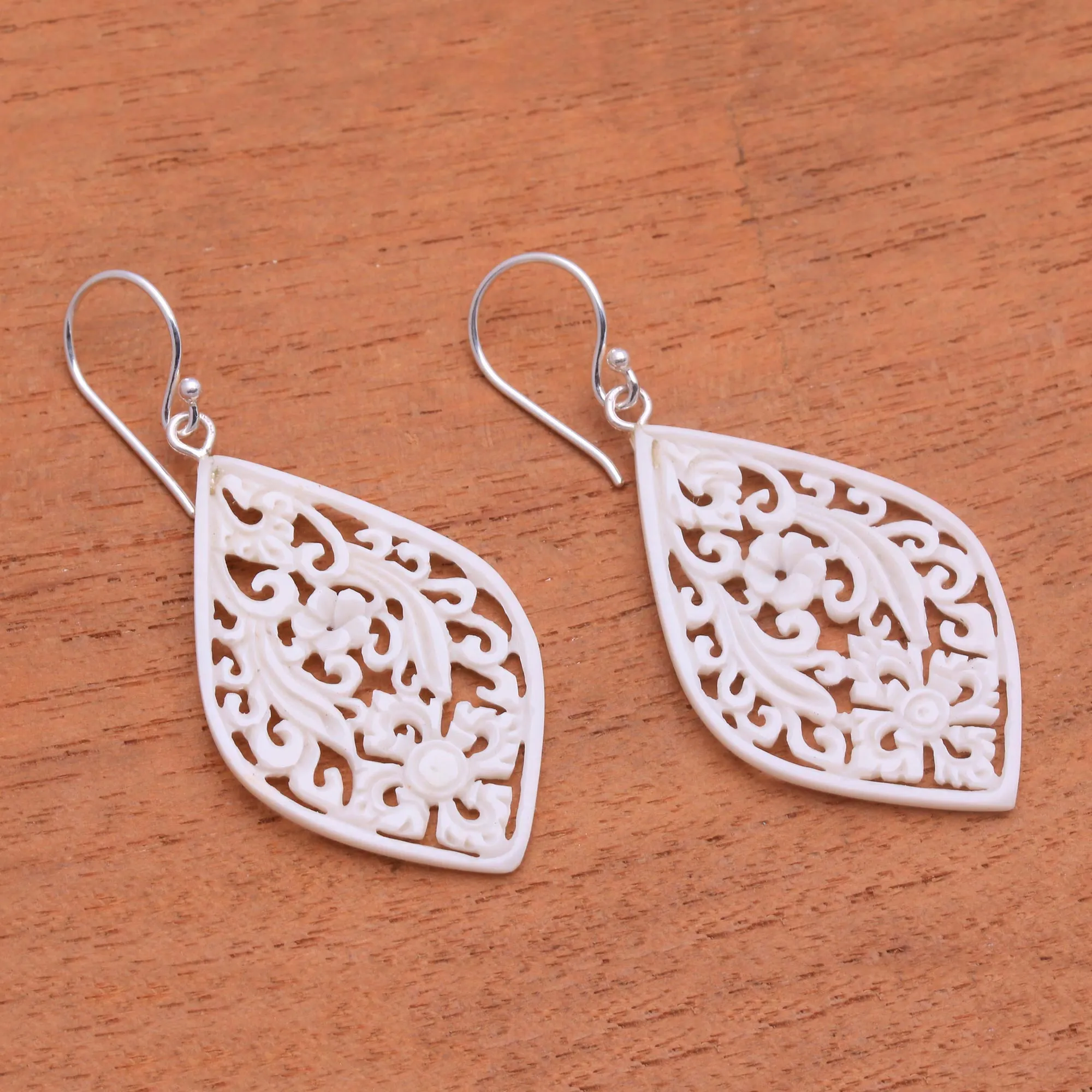 Hand-Carved Floral Bone Dangle Earrings from Bali - Bali Windows | NOVICA